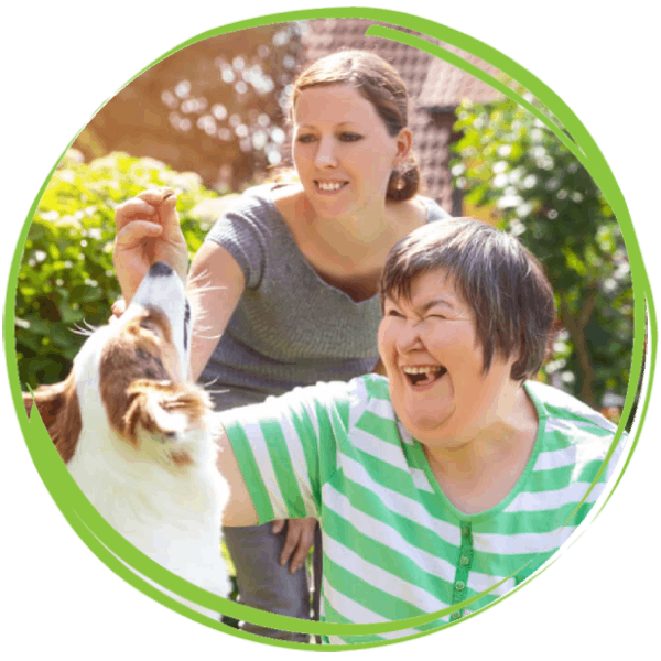 a-female-worker-and-a-dog-supporting-an-NDIS-participant