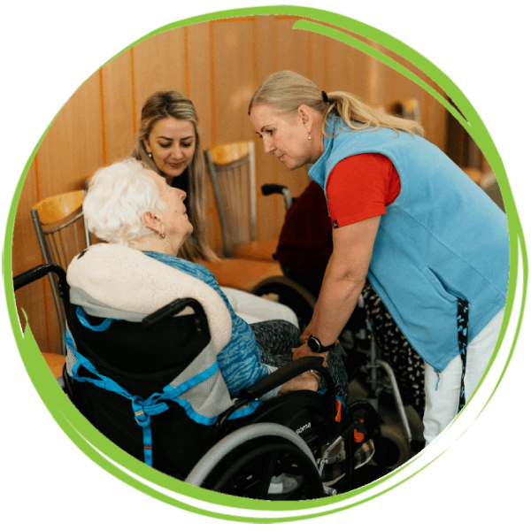 Female care giver working with an elderly woman for Quality Life Care Services career.